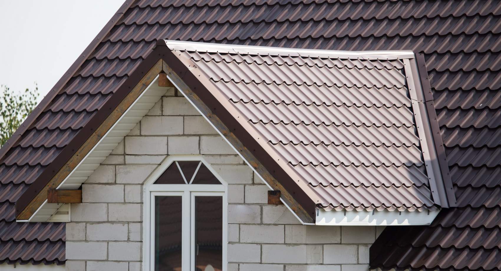 Roof with metal on the cottage as a background