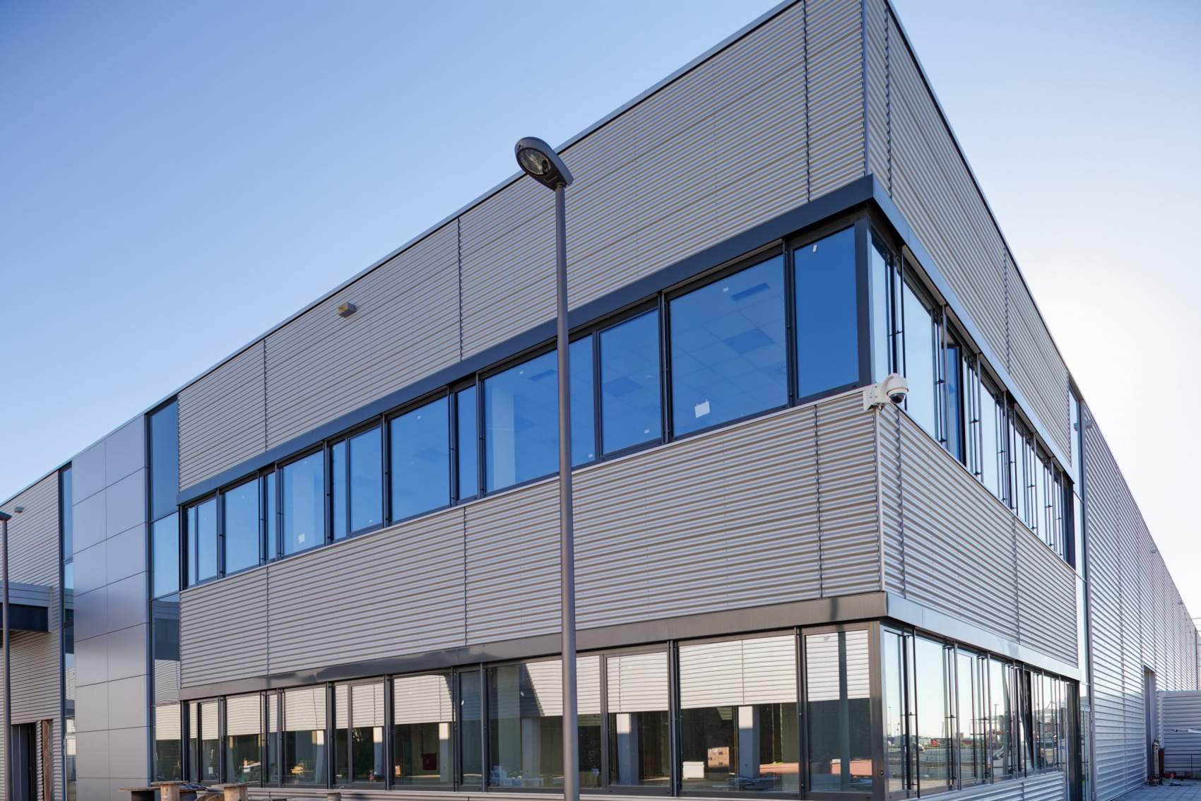 details of aluminum facade and aluminum panels on industrial building